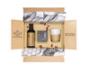 Gift pack with body oil, skincare and cup candle